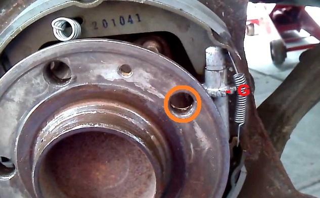 rear-brake-shows-adjuster-screw.jpg